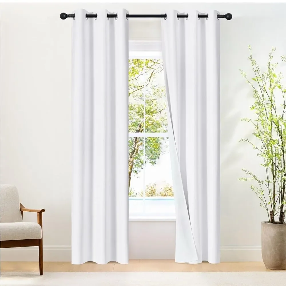 52‎ x 72 pair pure white blackout curtains. 1.6 silver Grommet